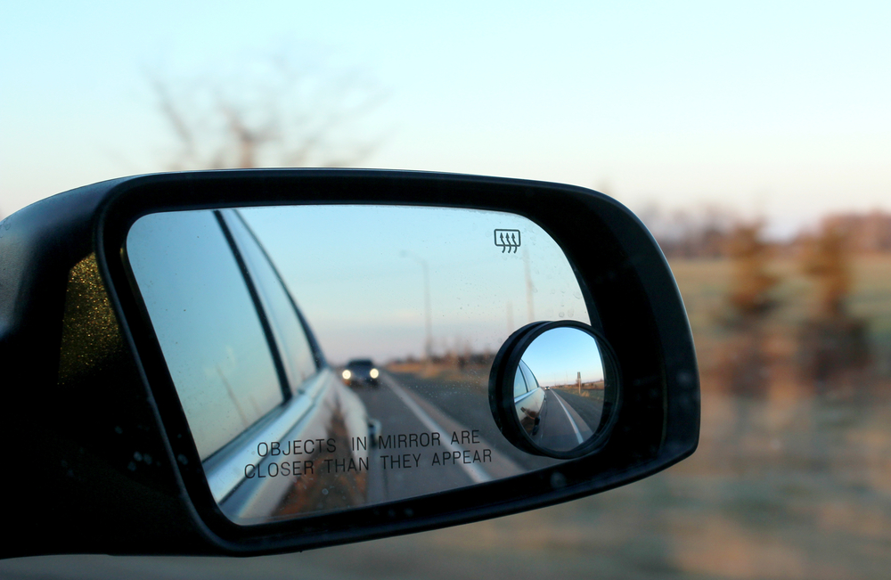 car mirror showing blind spot